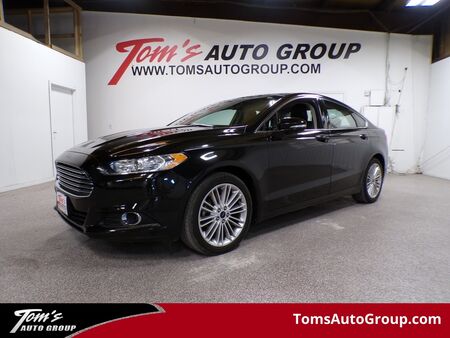 2014 Ford Fusion  - Tom's Auto Sales, Inc.