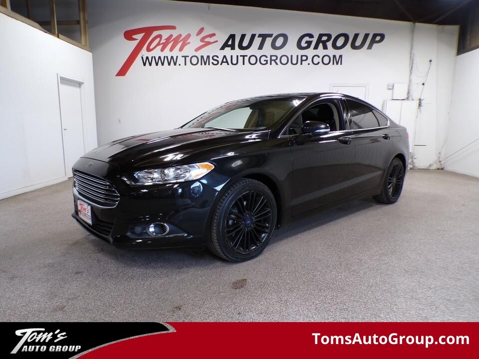 2013 Ford Fusion  - Tom's Auto Group