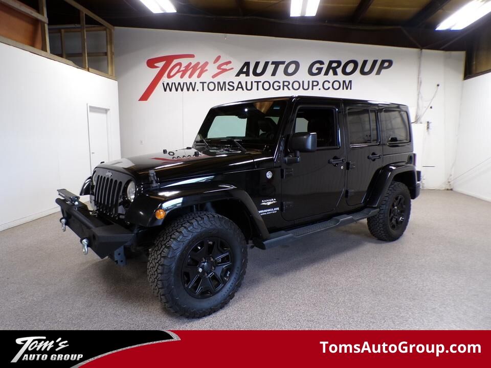 2014 Jeep Wrangler  - Tom's Auto Sales, Inc.