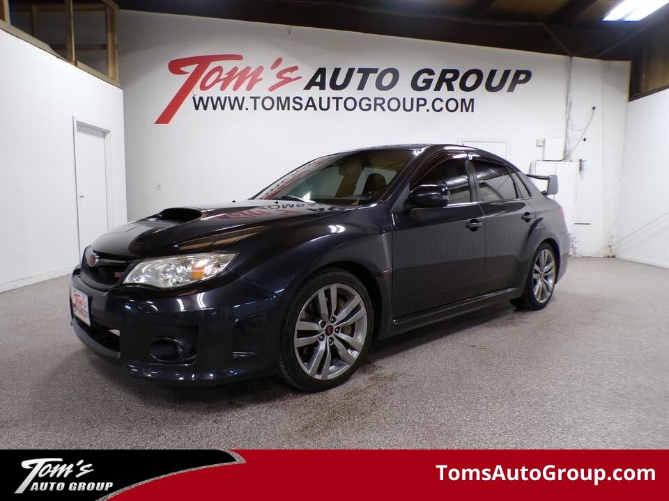 2013 Subaru Impreza  - Tom's Auto Group