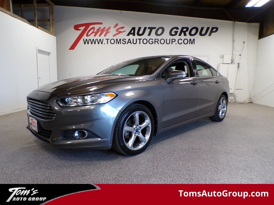 2013 Ford Fusion  - Tom's Auto Sales, Inc.